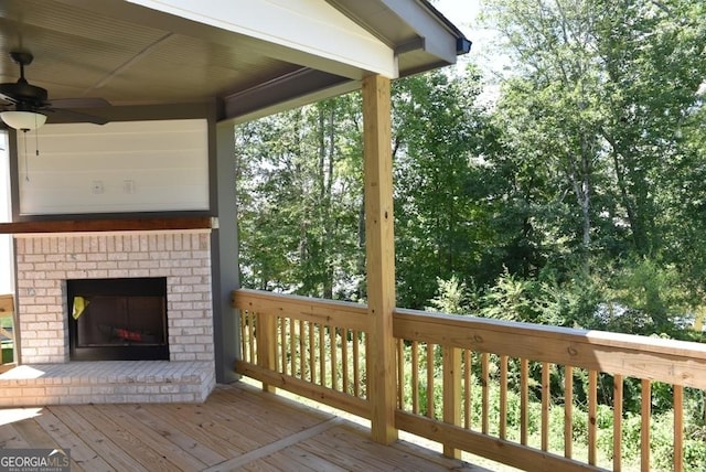 480 Brown Dove Ln, Grayson, GA 30017 - wooden terrace featuring a brick fireplace and a ceiling fan