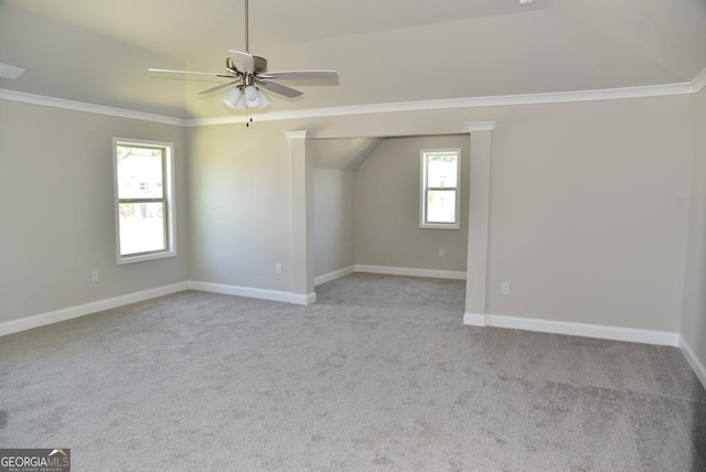 480 Brown Dove Ln, Grayson, GA 30017 - unfurnished room featuring visible vents, ceiling fan, baseboards, lofted ceiling, and ornamental molding