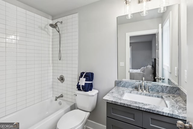 3119 Stonegate Dr SW, Atlanta, GA 30331 - ensuite bathroom featuring bathtub / shower combination, ensuite bath, toilet, and vanity