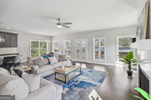 3119 Stonegate Dr SW, Atlanta, GA 30331 - living area with recessed lighting, baseboards, dark wood-style flooring, and ceiling fan with notable chandelier