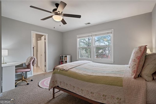 bedroom featuring visible vents, carpet floors, baseboards, and a ceiling fan