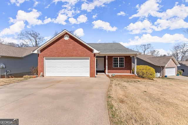 ranch-style house featuring concrete driveway, a garage, brick siding, and roof with shingles