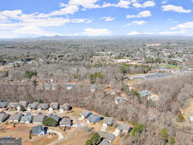 bird's eye view featuring a mountain view and a residential view