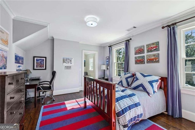 bedroom featuring multiple windows, wood finished floors, and visible vents