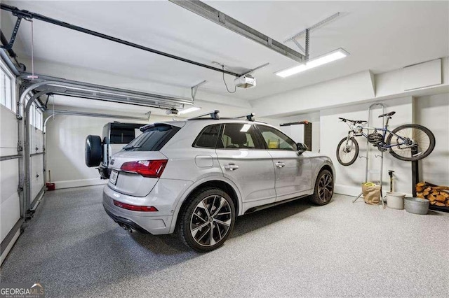 garage featuring a garage door opener