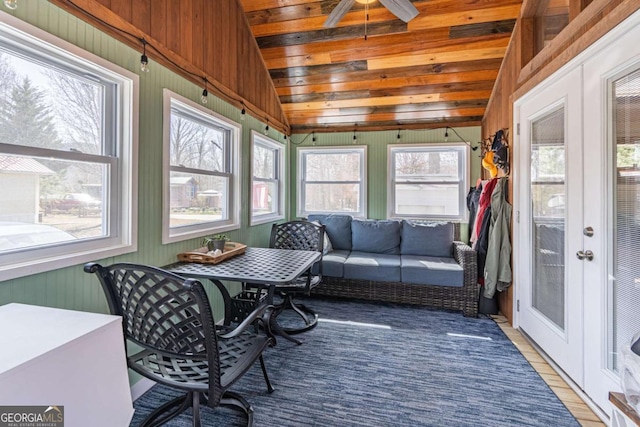 sunroom / solarium with wooden ceiling, french doors, and lofted ceiling