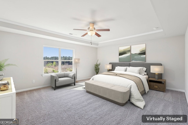 7783 Hansel Ln, Lithonia, GA 30058 - bedroom with a tray ceiling, baseboards, carpet floors, a ceiling fan, and ornamental molding