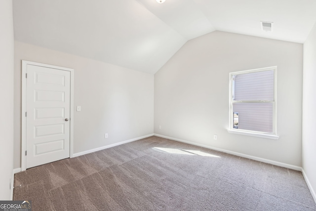 7783 Hansel Ln, Lithonia, GA 30058 - bonus room with lofted ceiling, carpet, and baseboards