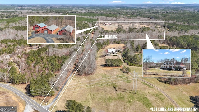 birds eye view of property with a rural view