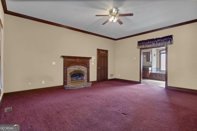 unfurnished living room with visible vents, a fireplace, baseboards, and carpet floors