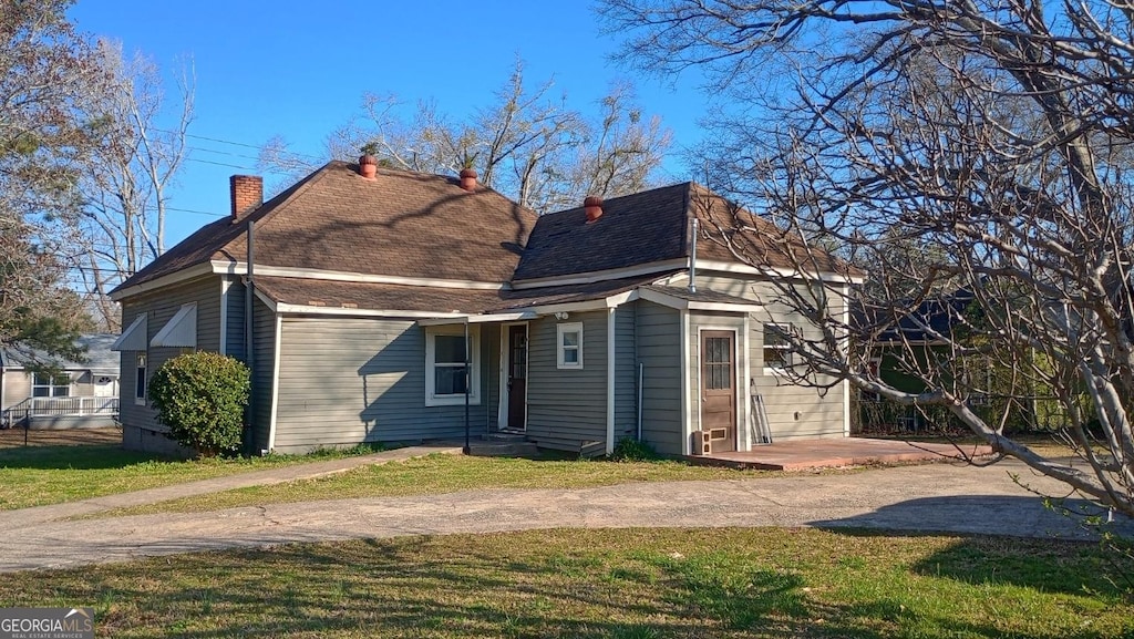 exterior space with a yard