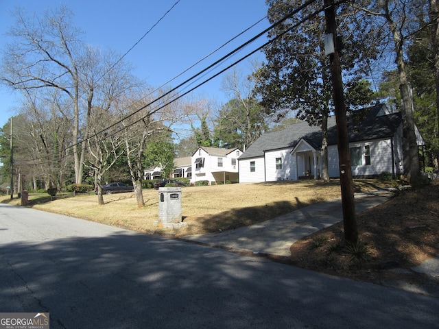 view of front of property with a front lawn