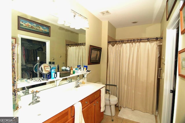 bathroom featuring tile patterned flooring, visible vents, vanity, and a shower with shower curtain