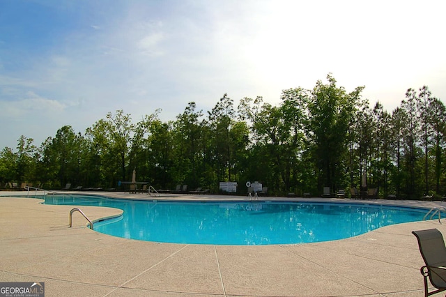 community pool featuring a patio