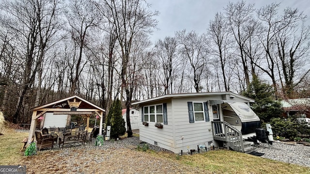 view of front of home with crawl space