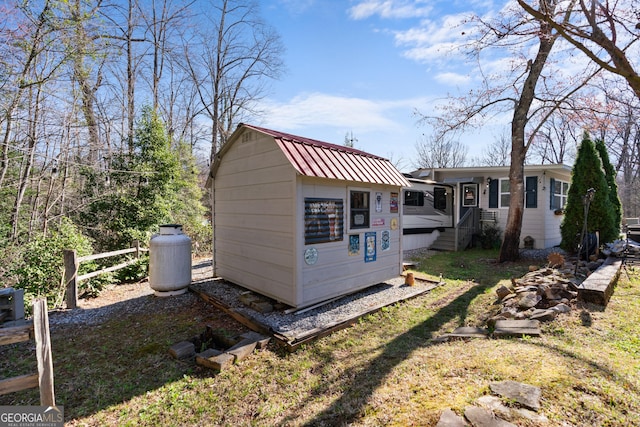 exterior space featuring an outdoor structure