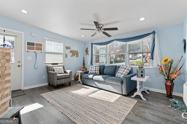 living room featuring baseboards, recessed lighting, ceiling fan, and dark wood-type flooring
