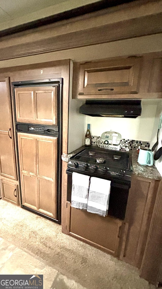 kitchen with exhaust hood