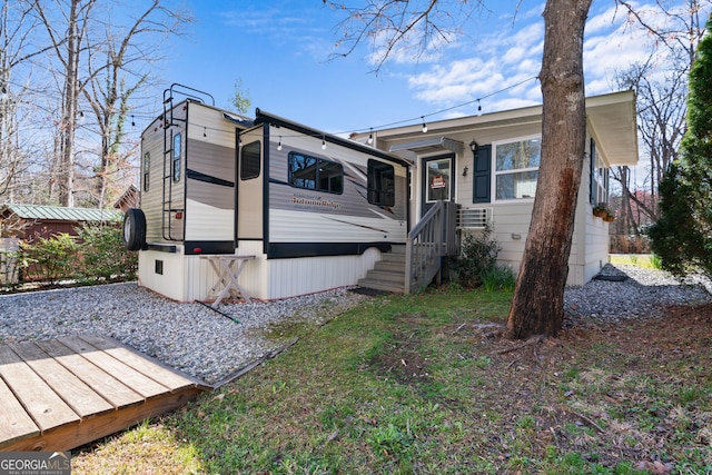 view of front of house featuring a deck