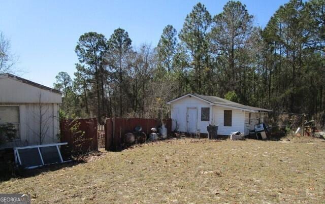 view of yard with fence