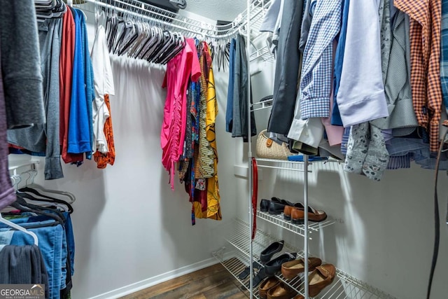 1901 Cumberland Ct SE, Smyrna, GA 30080 - spacious closet featuring wood finished floors