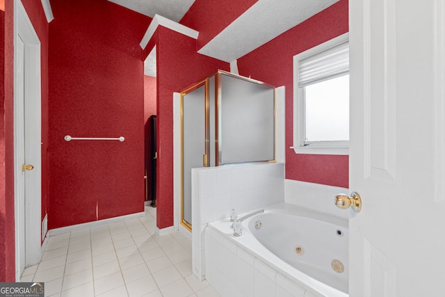 bathroom with a textured wall, a stall shower, a whirlpool tub, and tile patterned flooring