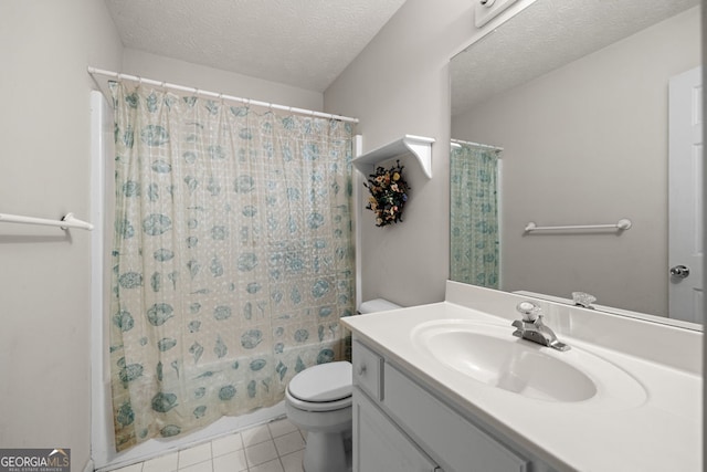 bathroom featuring vanity, a textured ceiling, tile patterned floors, toilet, and shower / tub combo with curtain