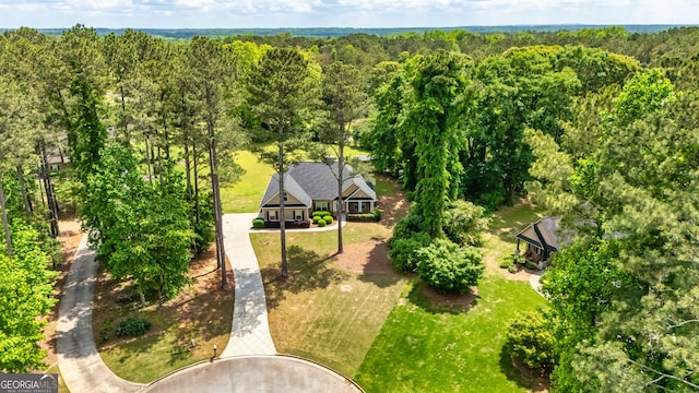 aerial view featuring a forest view