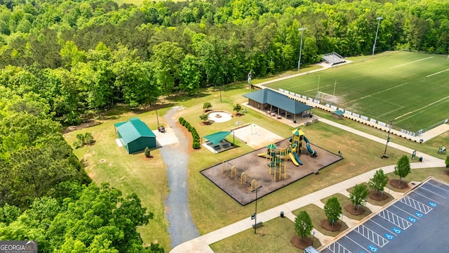 drone / aerial view featuring a forest view
