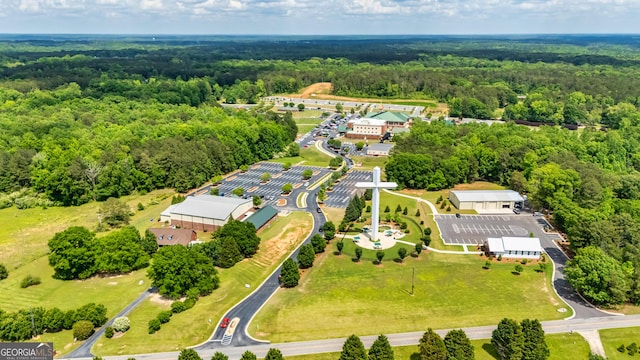 bird's eye view featuring a forest view