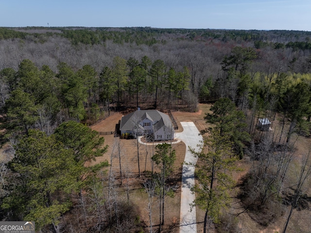 bird's eye view with a view of trees