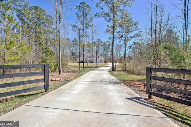 view of road featuring driveway