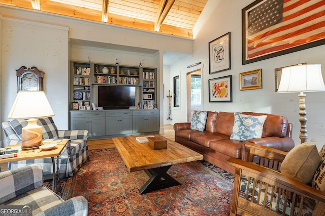 living area featuring wooden ceiling and vaulted ceiling with beams