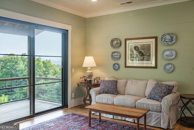 living room featuring wood finished floors and visible vents