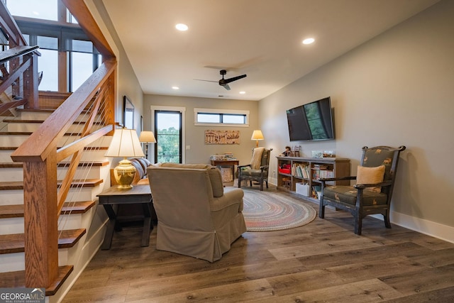 living area featuring stairway, recessed lighting, a ceiling fan, and wood finished floors