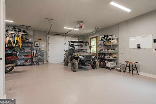 garage featuring a garage door opener