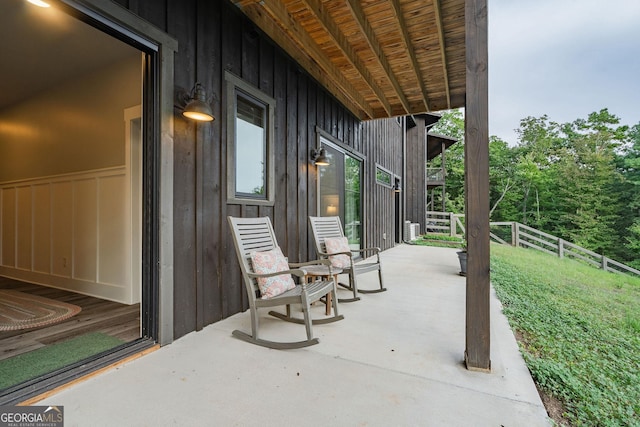 view of patio featuring fence