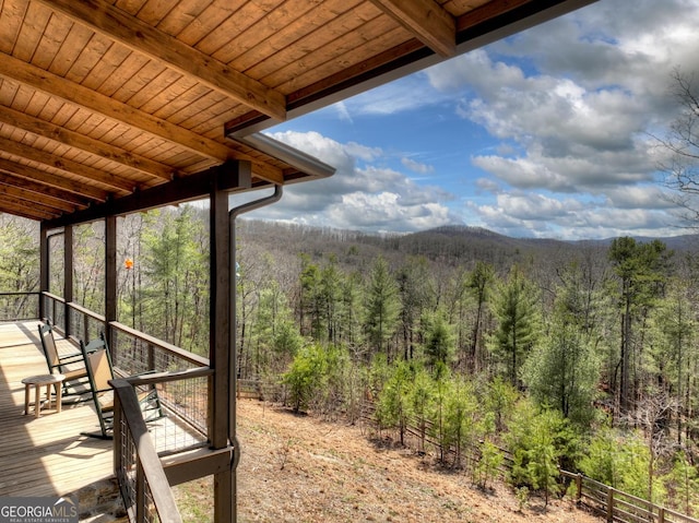 mountain view featuring a forest view