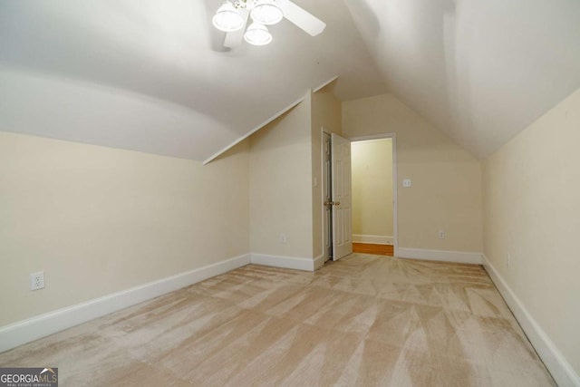 bonus room featuring vaulted ceiling, ceiling fan, baseboards, and carpet floors