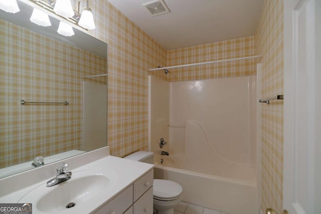 full bathroom featuring visible vents, wallpapered walls, toilet, tile patterned floors, and vanity