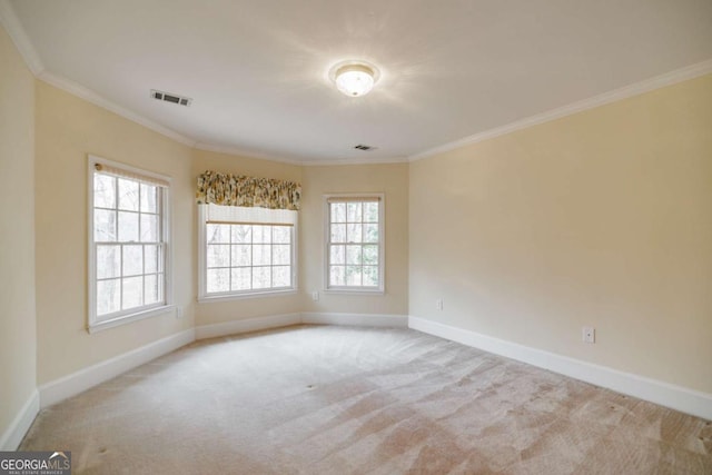 unfurnished room with visible vents, baseboards, carpet, and ornamental molding