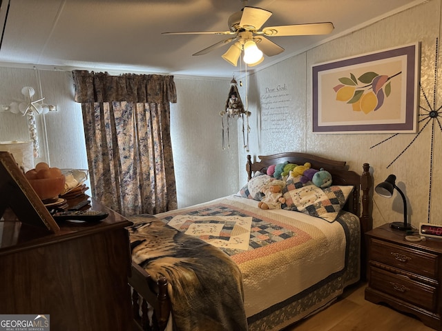 9 E Meadow Ln SW, Conyers, GA 30012 - bedroom with wood finished floors and a ceiling fan
