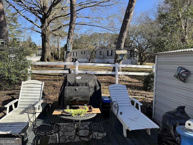 9 E Meadow Ln SW, Conyers, GA 30012 - wooden terrace featuring area for grilling