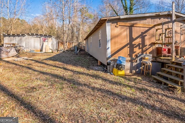 view of property exterior with an outdoor structure