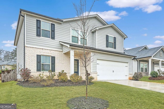 traditional-style home with brick siding, an attached garage, concrete driveway, and a front lawn