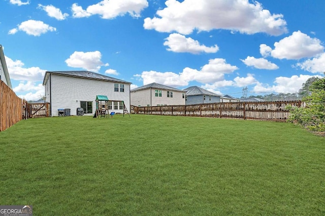 view of yard with a fenced backyard