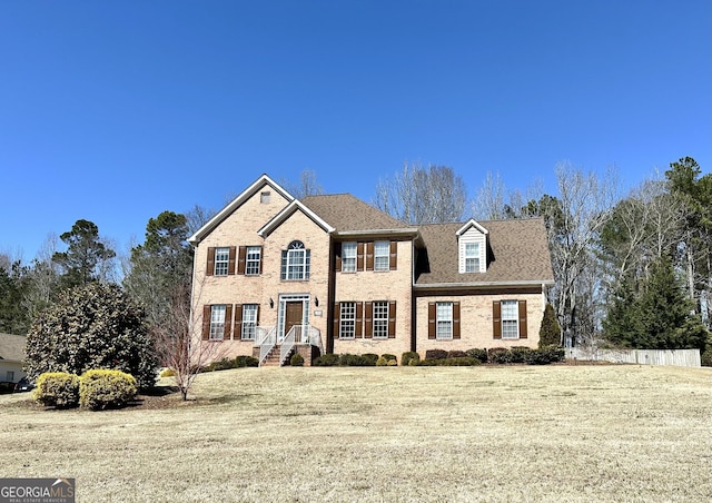 view of front of house with brick siding