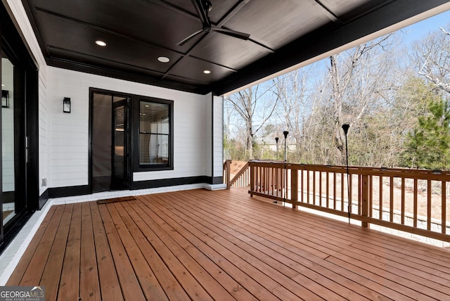 wooden terrace featuring ceiling fan