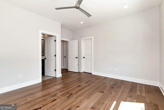 unfurnished bedroom featuring recessed lighting, wood finished floors, baseboards, and ceiling fan