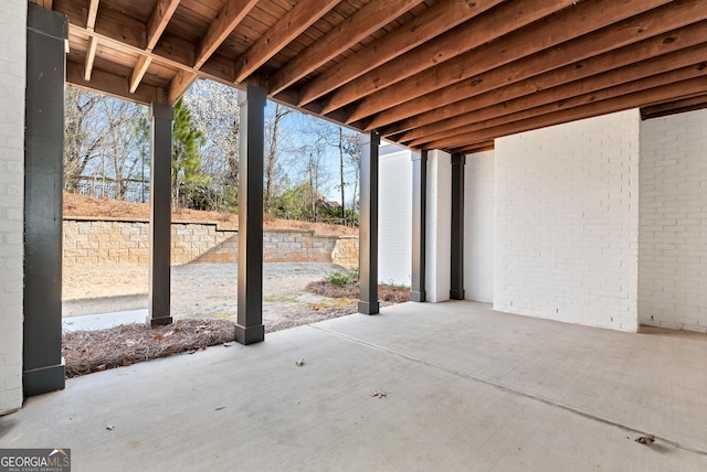 view of patio / terrace featuring fence